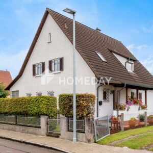 Zweifamilienhaus mit großem Garten, Garage und vielseitigem Potenzial