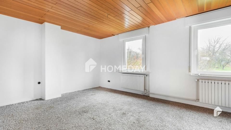 Charmantes Zweifamilienhaus mit großem Grundstück in ruhiger Lage – Bild 14