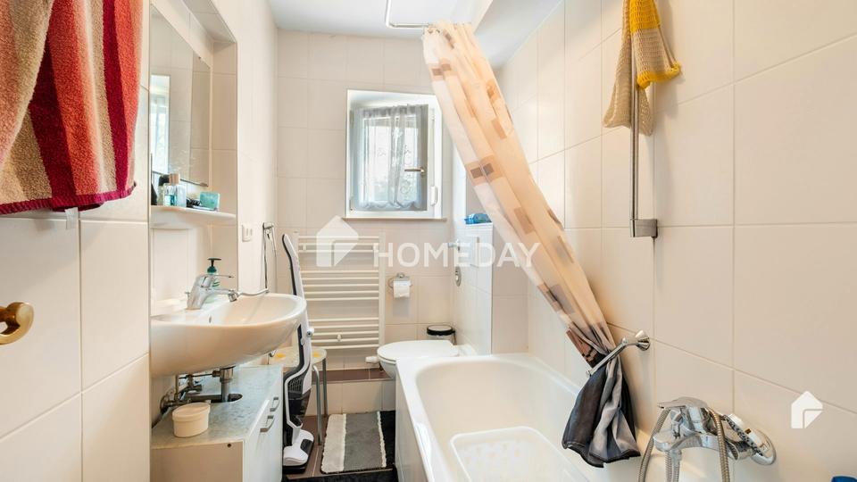 Ruhig und grün gelegen: Gepflegte & praktische ETW mit Fensterbad, Keller, Abstellraum und Stellpl. – Bild 7