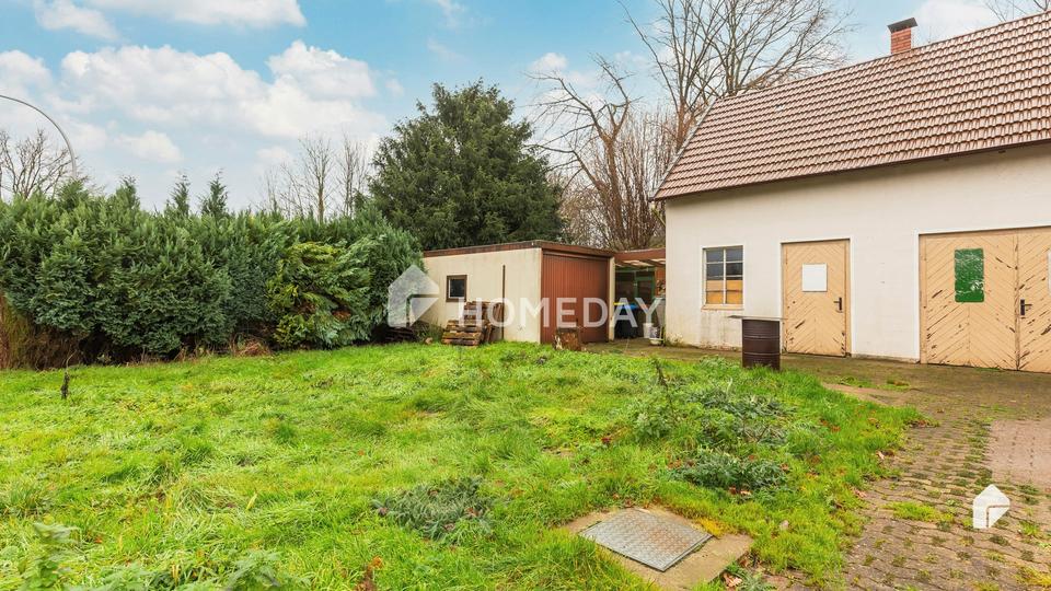 Charmantes Zweifamilienhaus mit großem Grundstück in ruhiger Lage – Bild 4