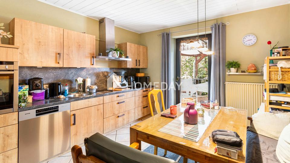 Hier wohnt, wer das Echte schätzt: charmantes EFH mit Einliegerwohnung, großem Garten und Garage – Bild 8