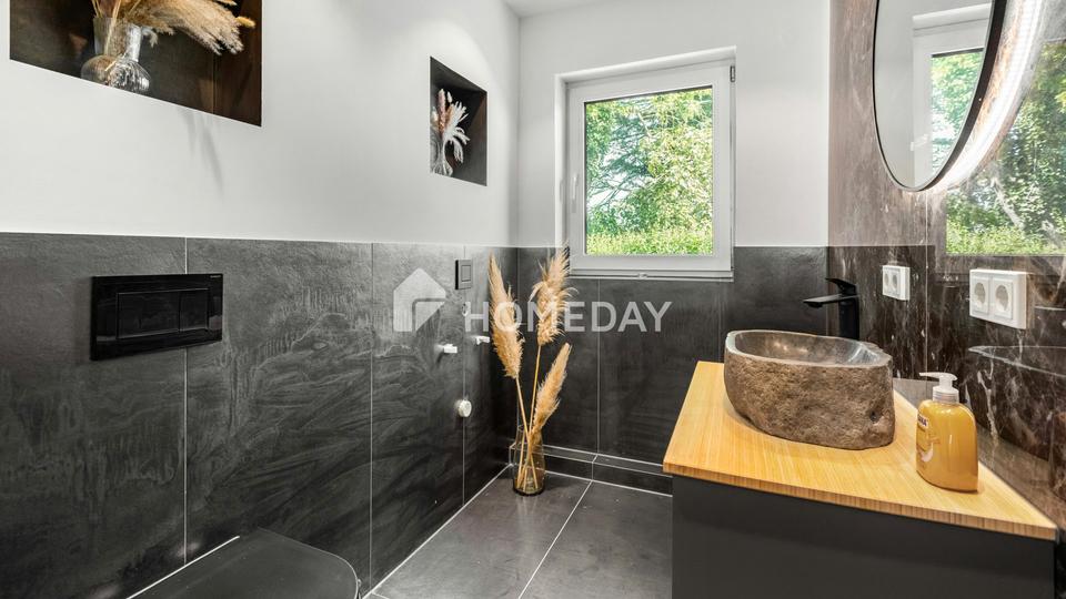 Modernisiertes Einfamilienhaus mit großzügigem Wohnkomfort und nachhaltiger Technik – Bild 11