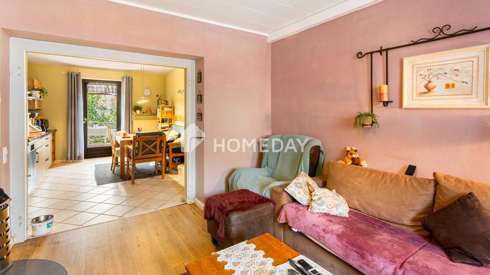 Hier wohnt, wer das Echte schätzt: charmantes EFH mit Einliegerwohnung, großem Garten und Garage – Bild 7