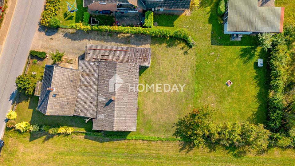 Grundstück mit Altbestand – ideal für Neubebauung