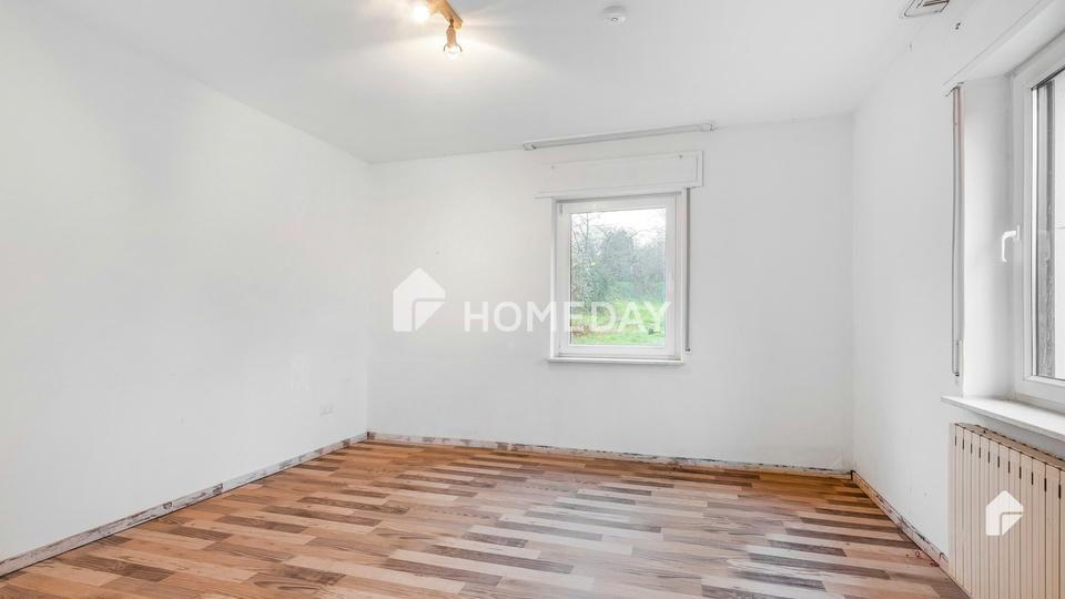 Charmantes Zweifamilienhaus mit großem Grundstück in ruhiger Lage – Bild 11