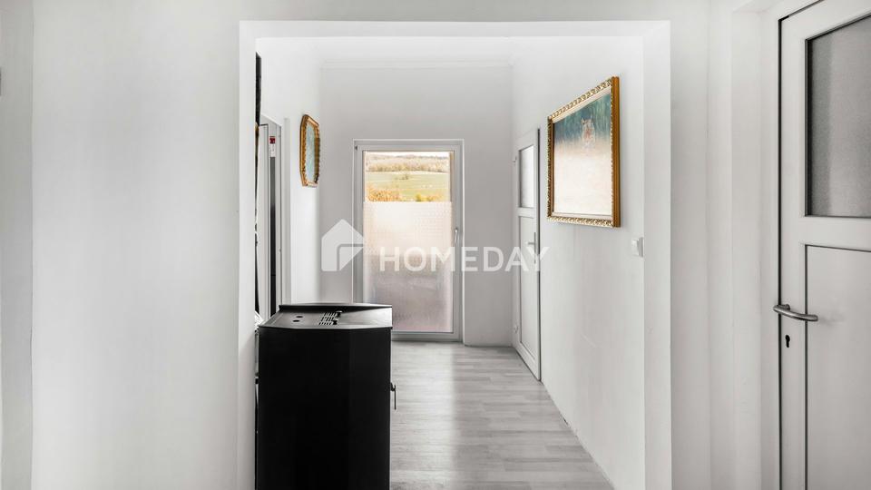 Vielseitig nutzbar & sofort verfügbar: Einfamilienhaus mit ELW und schönem Grundstück – Bild 7