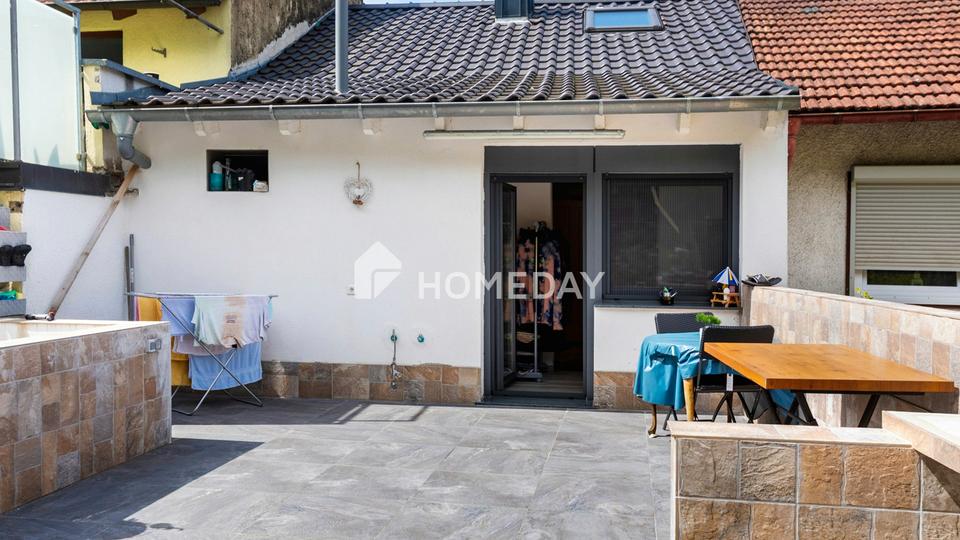 Geräumiges Reihenmittelhaus mit neuer Terrasse und direktem Garagenzugang – Ihr Traumzuhause! – Bild 2