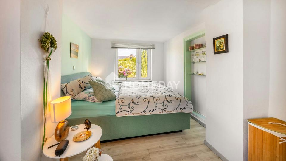 Familienfreundliches Zuhause mit Garten, Garage und Nähe zum Wasser – Bild 11