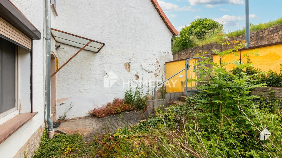 Haus im Dornröschenschlaf – diese Immobilie wartet auf liebevolle Umgestaltung und Renovierung – Bild 4