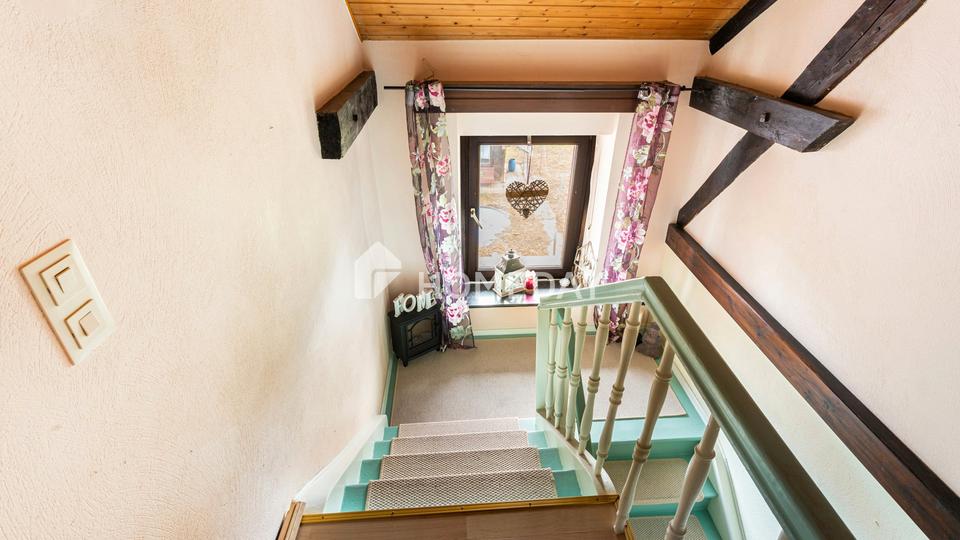 Hier wohnt, wer das Echte schätzt: charmantes EFH mit Einliegerwohnung, großem Garten und Garage – Bild 14