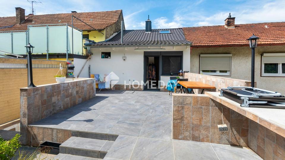 Geräumiges Reihenmittelhaus mit neuer Terrasse und direktem Garagenzugang – Ihr Traumzuhause! – Bild 3