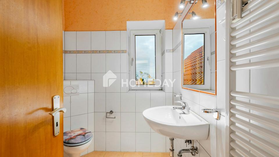 Charmantes Zweifamilienhaus mit Garten, Garagen in Obernkirchen – Bild 16