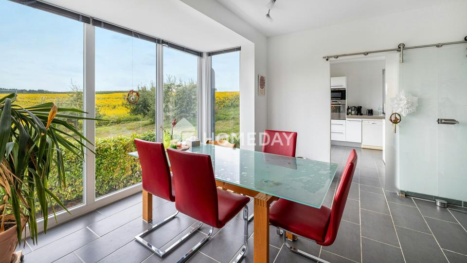 Modernes Einfamilienhaus mit Einliegerwohnung in Hanglage und tollem Ausblick – Bild 16