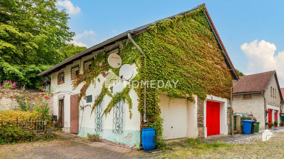 Charmantes Mehrfamilienhaus mit Terrasse und Garage – Bild 15