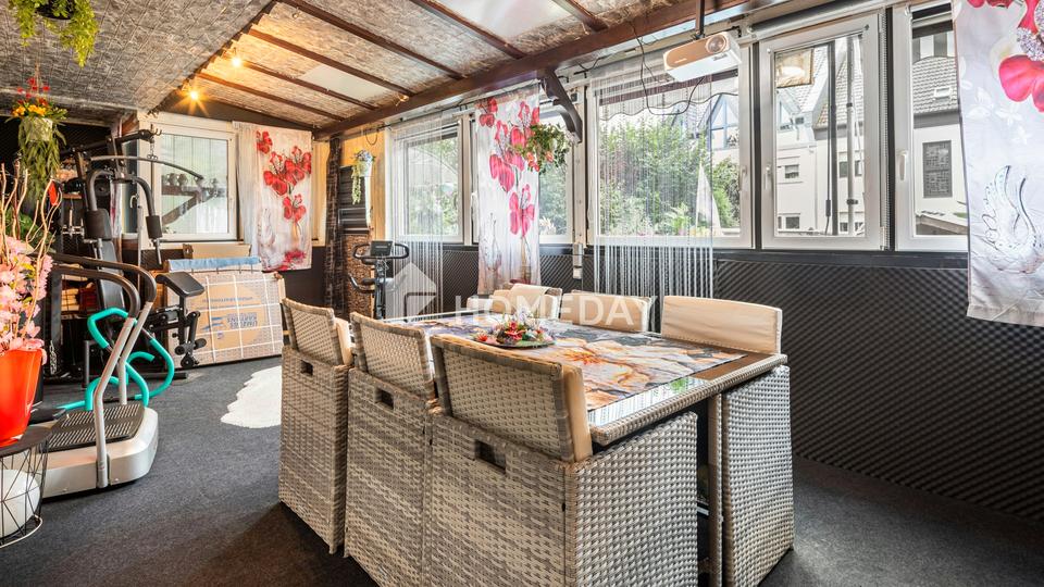 Zweifamilienhaus mit 210 m² Wohnfläche, Wintergärten, Loggia und gepflegtem Gartenparadies – Bild 6