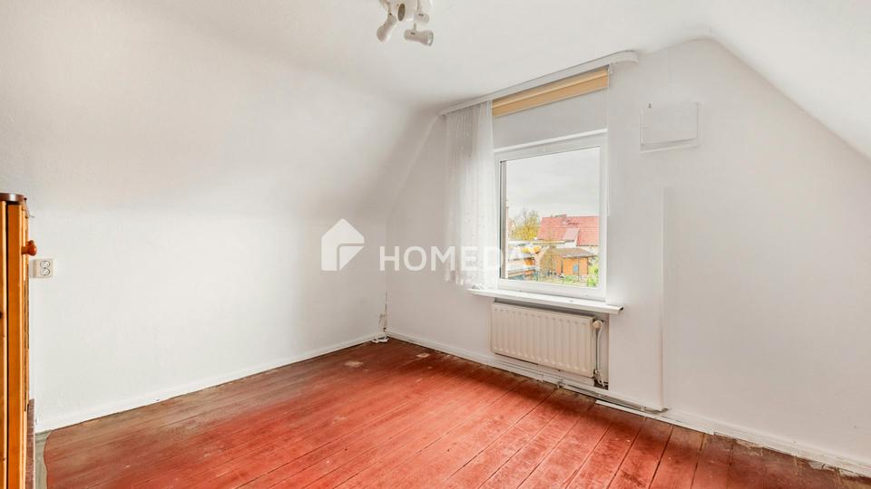 Viel Platz für Ihre Ideen: Einfamilienhaus mit 4 Zimmern, großem Garten und Nebengebäude – Bild 18