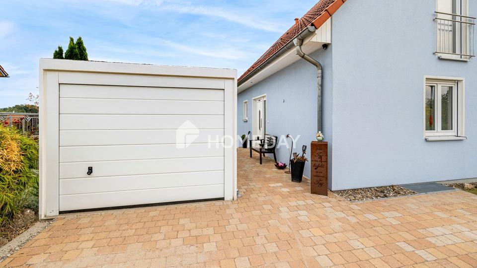 Modernes Einfamilienhaus mit Einliegerwohnung in Hanglage und tollem Ausblick – Bild 8