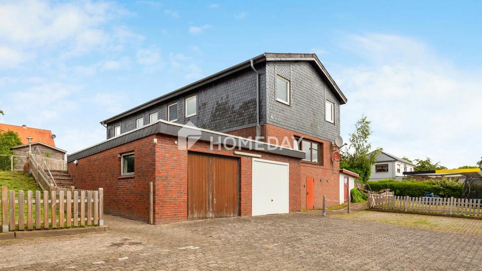 Gepflegtes Mehrfamilienhaus mit 3 Wohneinheiten und zusätzlichem Ausbaupotenzial – Bild 4