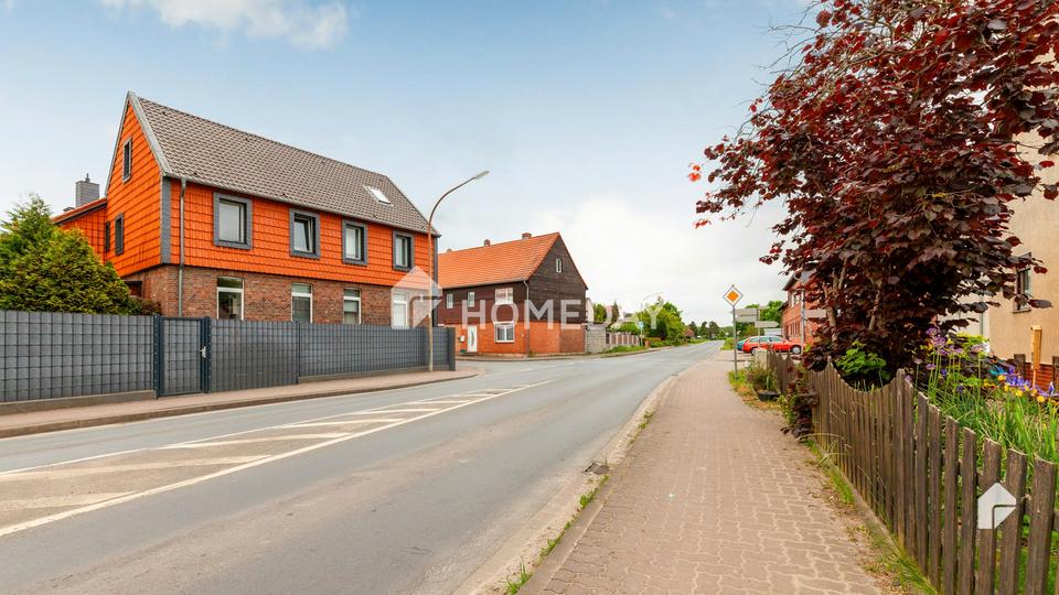 Charmantes Mehrfamilienhaus mit zwei Wohneinheiten, Garage, Carport und großzügigem Garten – Bild 15