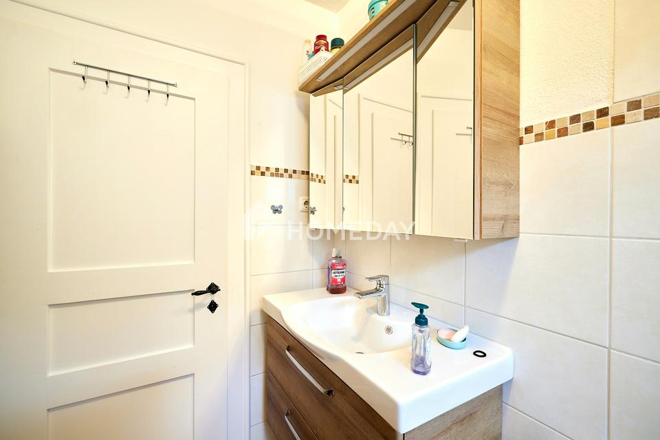 Gepflegte DHH mit vier Wohneinheiten, großem Garten und stabilem Mietertrag in zentraler Lage – Bild 17