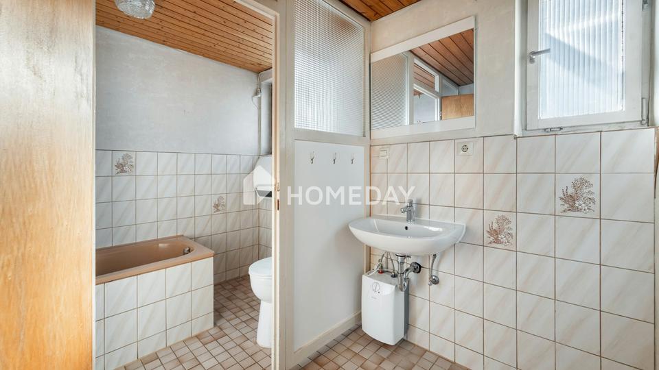 Freistehendes Einfamilienhaus in Hanglage mit Geschichte und Charakter – Bild 12