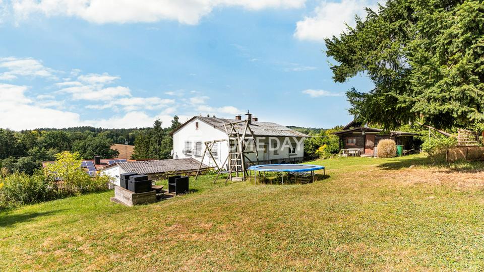 Familienidyll mit sechs Zimmern, moderner Küche und überdachter Terrasse – Bild 8