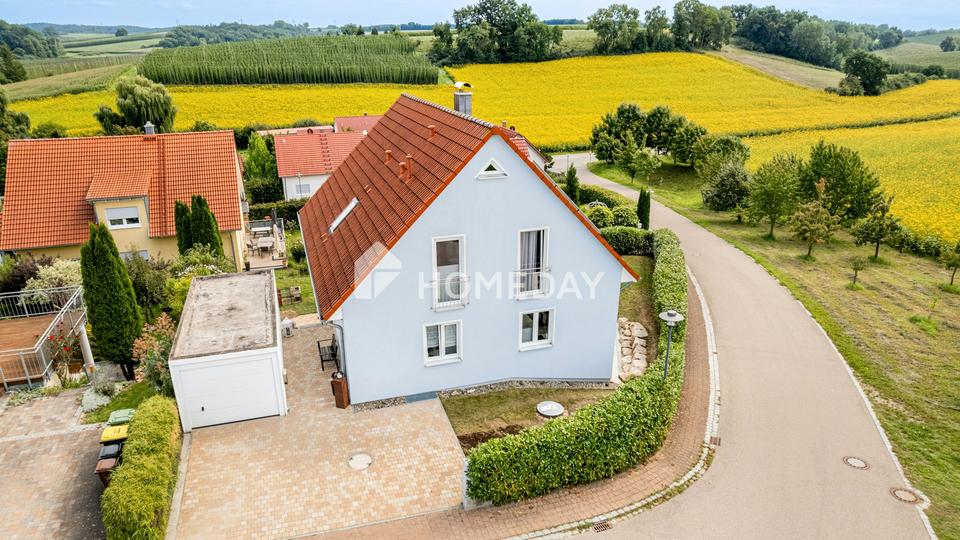 Modernes Einfamilienhaus mit Einliegerwohnung in Hanglage und tollem Ausblick – Bild 11