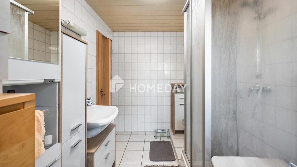 Am Feldrand und idyllisch gelegen: DHH mit Südterrasse, EBK + Carport | Gepflegt | Großes Grundstück – Bild 8