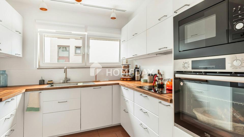 Rückzugsort mit Freiraum: 5-Zimmer-Wohnung mit Garten und Garage – Bild 5