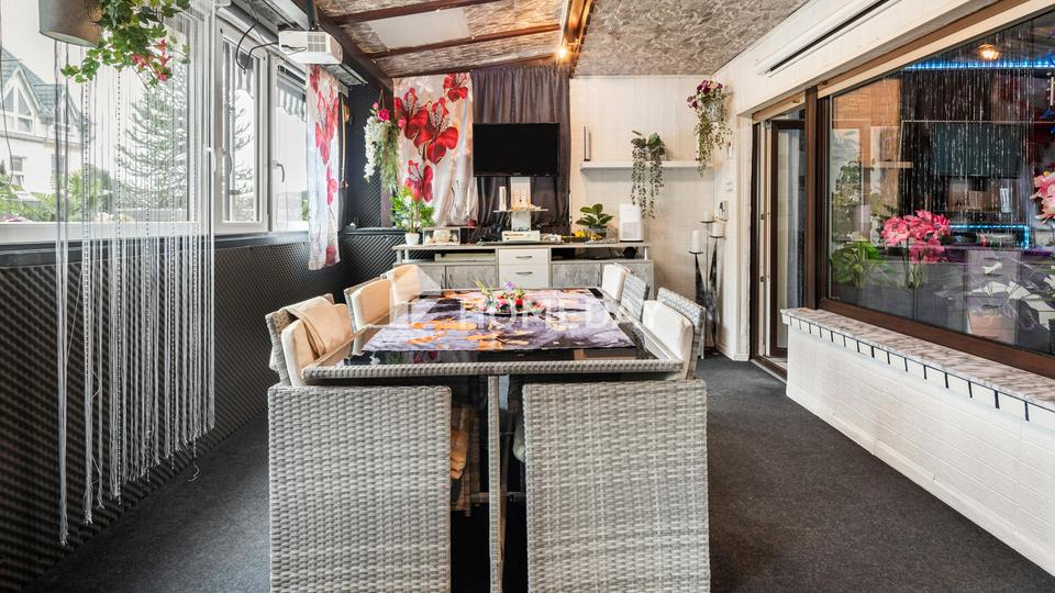 Zweifamilienhaus mit 210 m² Wohnfläche, Wintergärten, Loggia und gepflegtem Gartenparadies – Bild 7