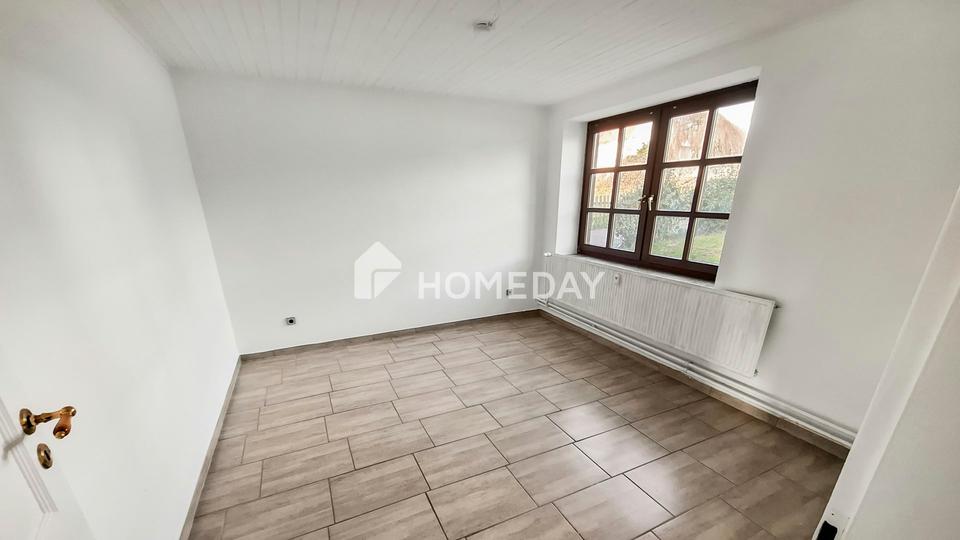 Gepflegtes Mehrfamilienhaus mit 3 Wohneinheiten und zusätzlichem Ausbaupotenzial – Bild 13