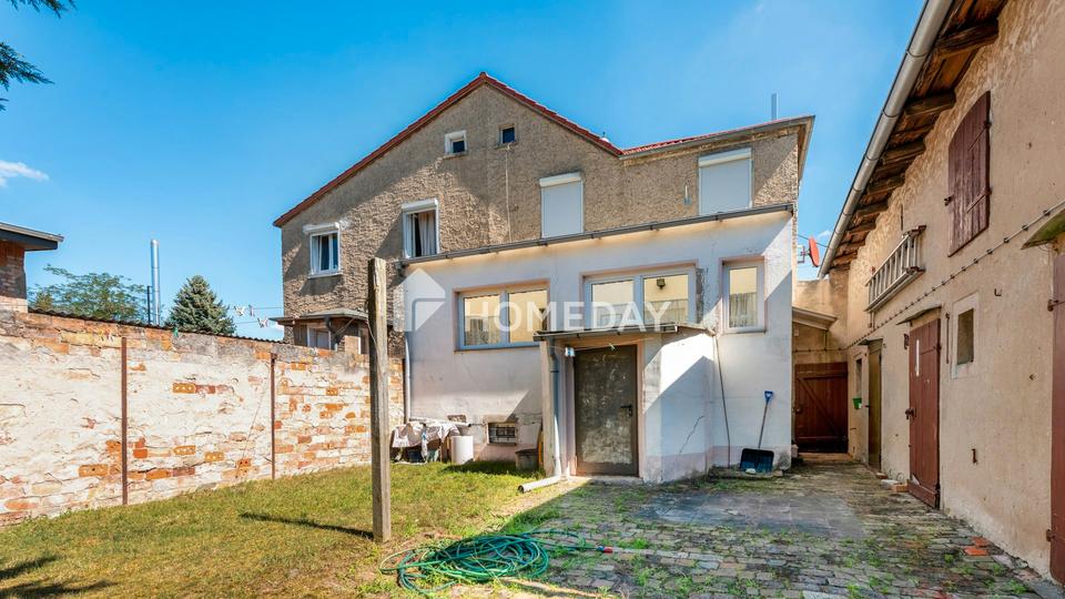 Familienidyll mit Wintergarten, Balkon und großem Grundstück – Bild 3