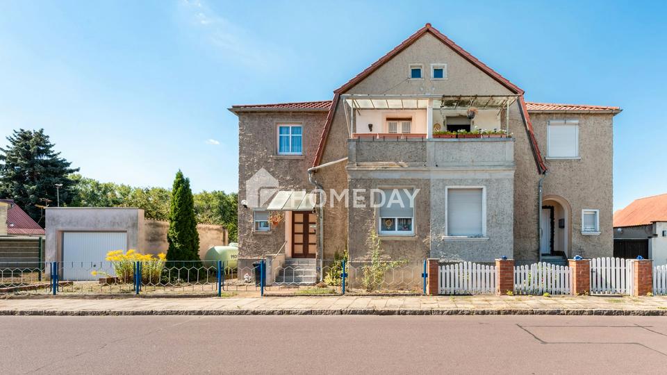 Familienidyll mit Wintergarten, Balkon und großem Grundstück