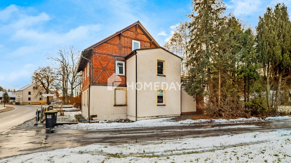 Familienfreundliches Einfamilienhaus mit 6 Zimmern, Garten, Balkon und Garagen – Bild 2