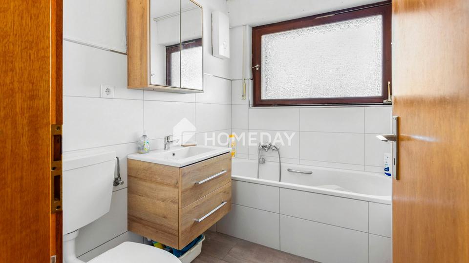 Modernisiertes Einfamilienhaus mit separater Einliegerwohnung und großem Grundstück – Bild 9