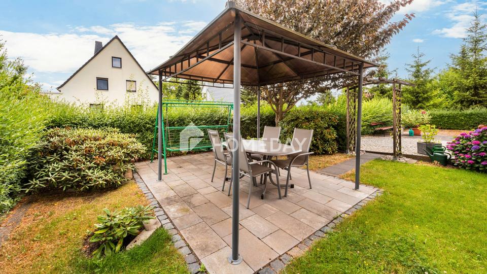 Idyllische Wohnqualität mit Garage, Garten, überdachter Südterrasse, Nebengebäude & Raumvielfalt – Bild 4