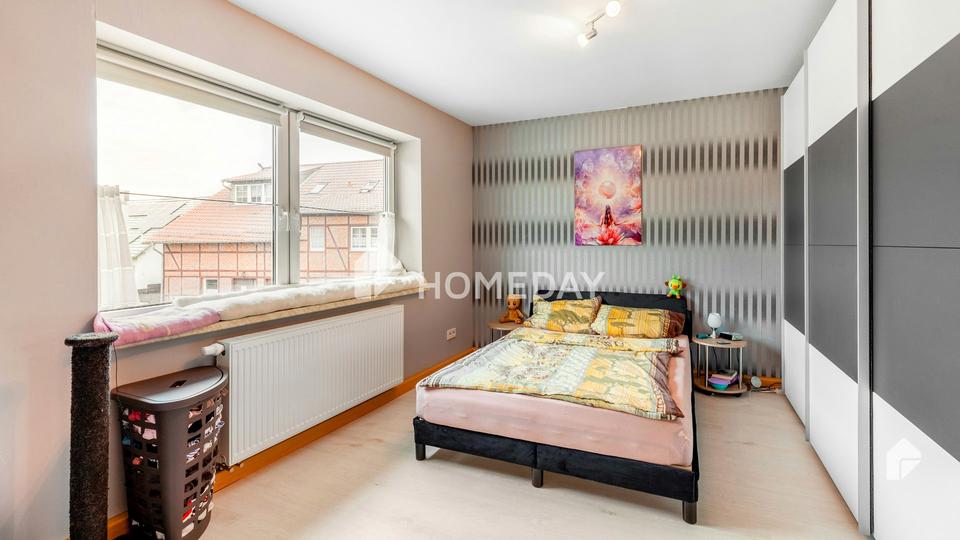 Charmantes Mehrfamilienhaus mit zwei Wohneinheiten, Garage, Carport und großzügigem Garten – Bild 6