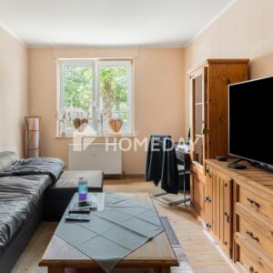 Sofort bezugsfrei: Charmante Erdgeschosswohnung mit Loggia und Gartenmitbenutzung