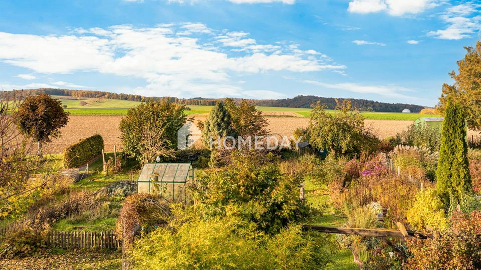 Großzügig & naturnah: EFH mit Garten, Terrasse, Garage und herrlichem Ausblick in Östrum – Bild 8