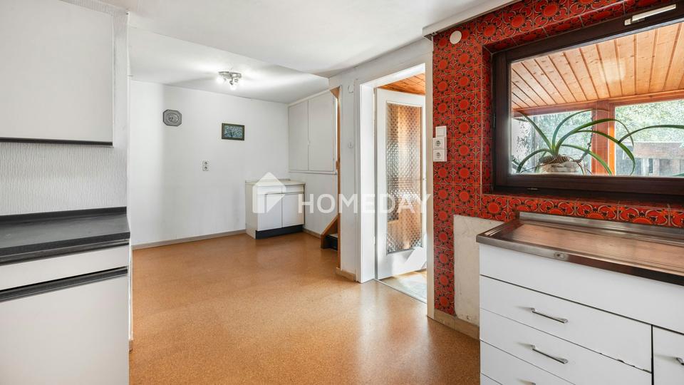 Freistehendes Einfamilienhaus in Hanglage mit Geschichte und Charakter – Bild 11