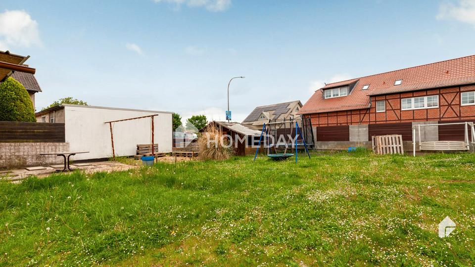Charmantes Mehrfamilienhaus mit zwei Wohneinheiten, Garage, Carport und großzügigem Garten – Bild 11