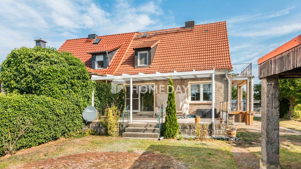 Familienfreundliche Doppelhaushälfte mit 5 Zimmern, Keller und schönem Garten – Bild 2