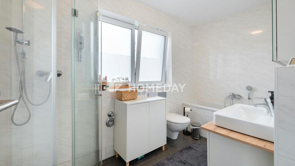 Moderne Maisonettewohnung mit Südterrasse und Garten – Bild 11