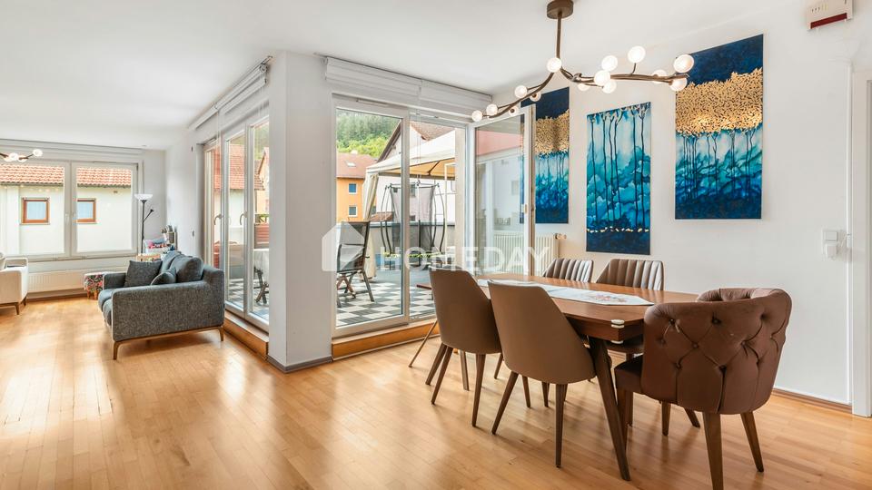 Rückzugsort mit Freiraum: 5-Zimmer-Wohnung mit Garten und Garage – Bild 2