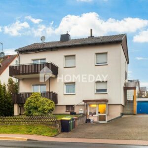 Einfamilienhaus mit zwei Wohnbereichen, großer Garage und Büro/Gewerbefläche