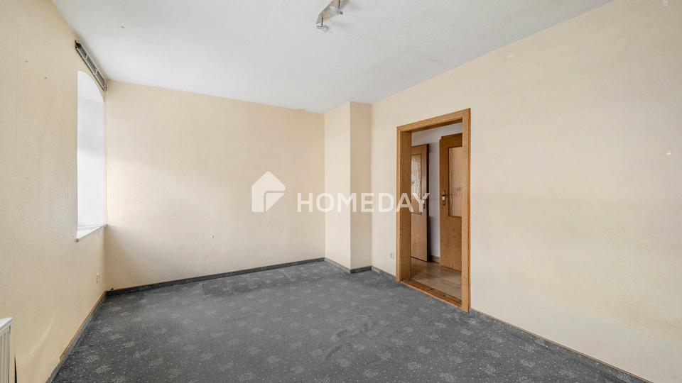 Familienfreundliches Einfamilienhaus mit 6 Zimmern, Garten, Balkon und Garagen – Bild 11