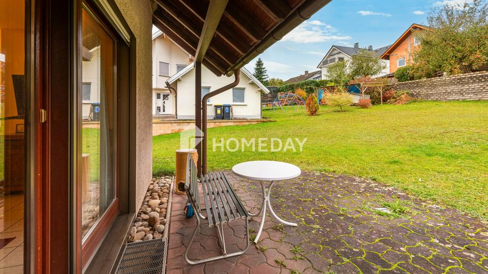 Familienfreundliches EFH mit großem Garten, Terrasse, EBK und Garagen in ruhiger Lage – Bild 4