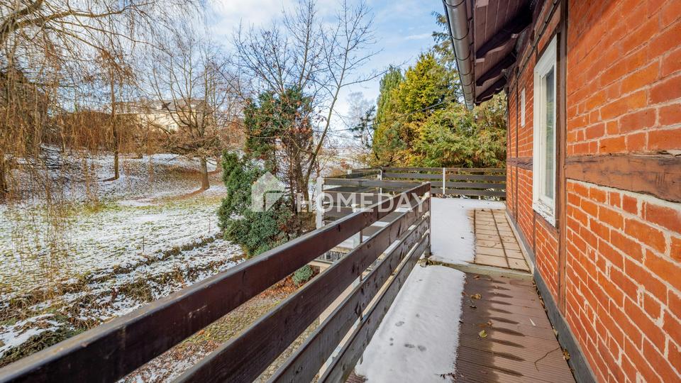 Familienfreundliches Einfamilienhaus mit 6 Zimmern, Garten, Balkon und Garagen – Bild 6