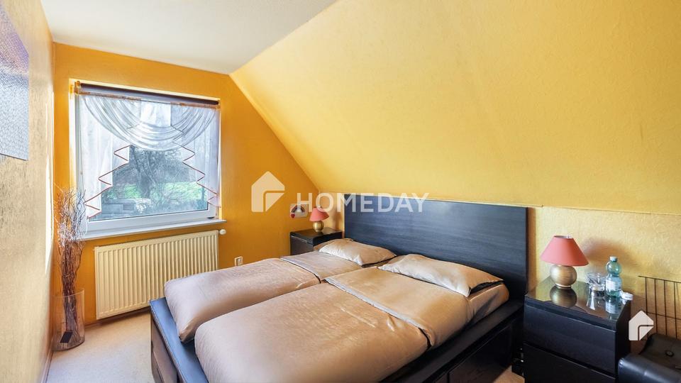 Am Feldrand und idyllisch gelegen: DHH mit Südterrasse, EBK + Carport | Gepflegt | Großes Grundstück – Bild 10