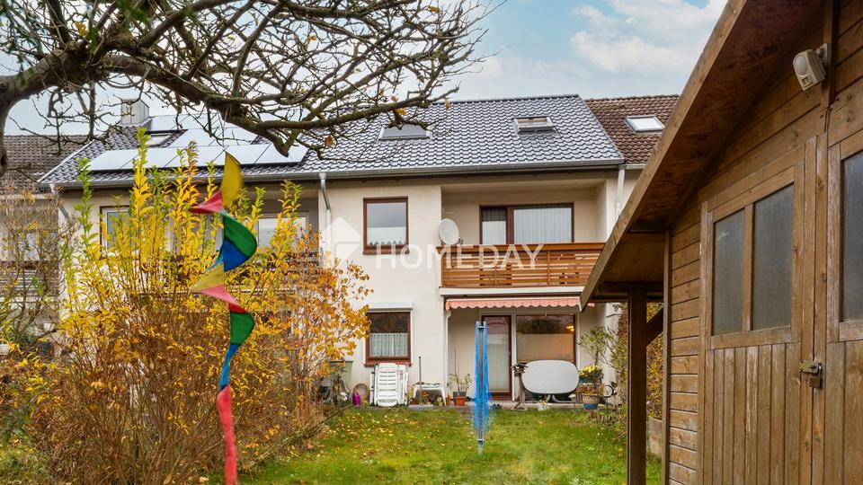 Charmantes Reihenhaus von 1954 mit Garten, Garage und moderner Dachsanierung auf Erbpachtgrundstück – Bild 3